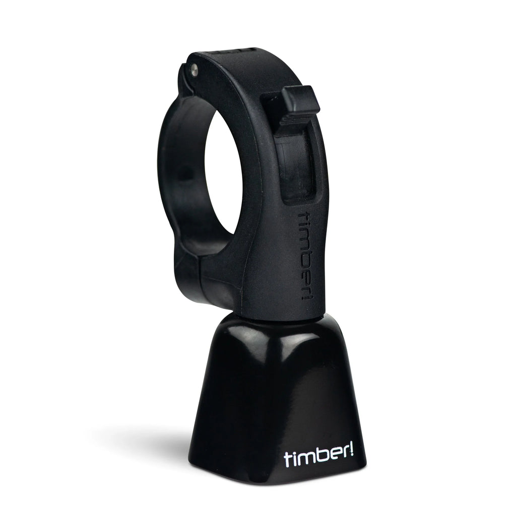 Timber Model Yew bolt-on trail bell in black on its handlebar clamp