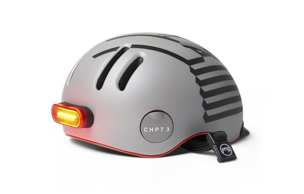 Chapter MIPS Helmet, gray with black stripe graphic, side view with rear light on