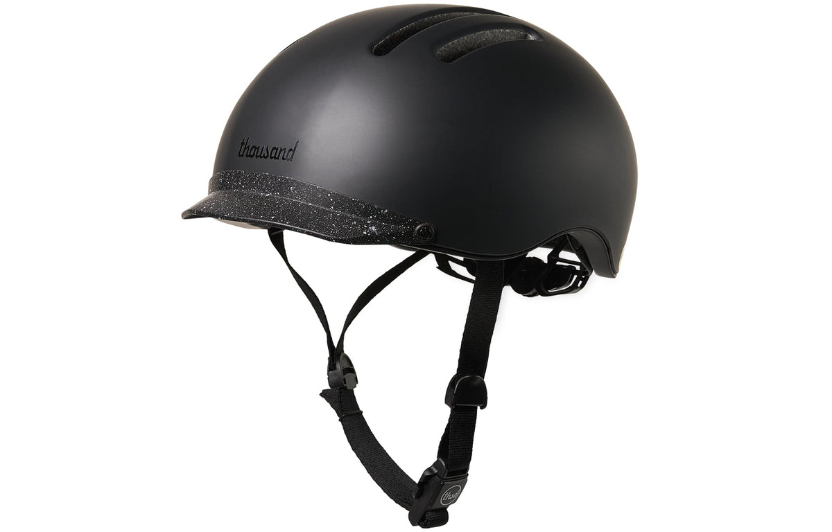 Chapter MIPS Helmet, black with speckled visor, side view with straps