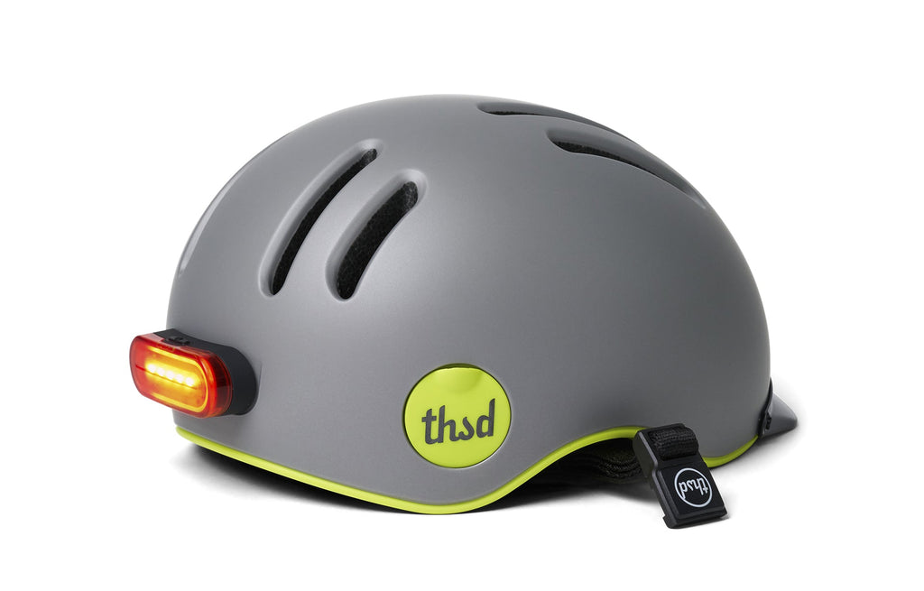 Chapter MIPS Helmet, gray with neon yellow trim, side view with rear light on