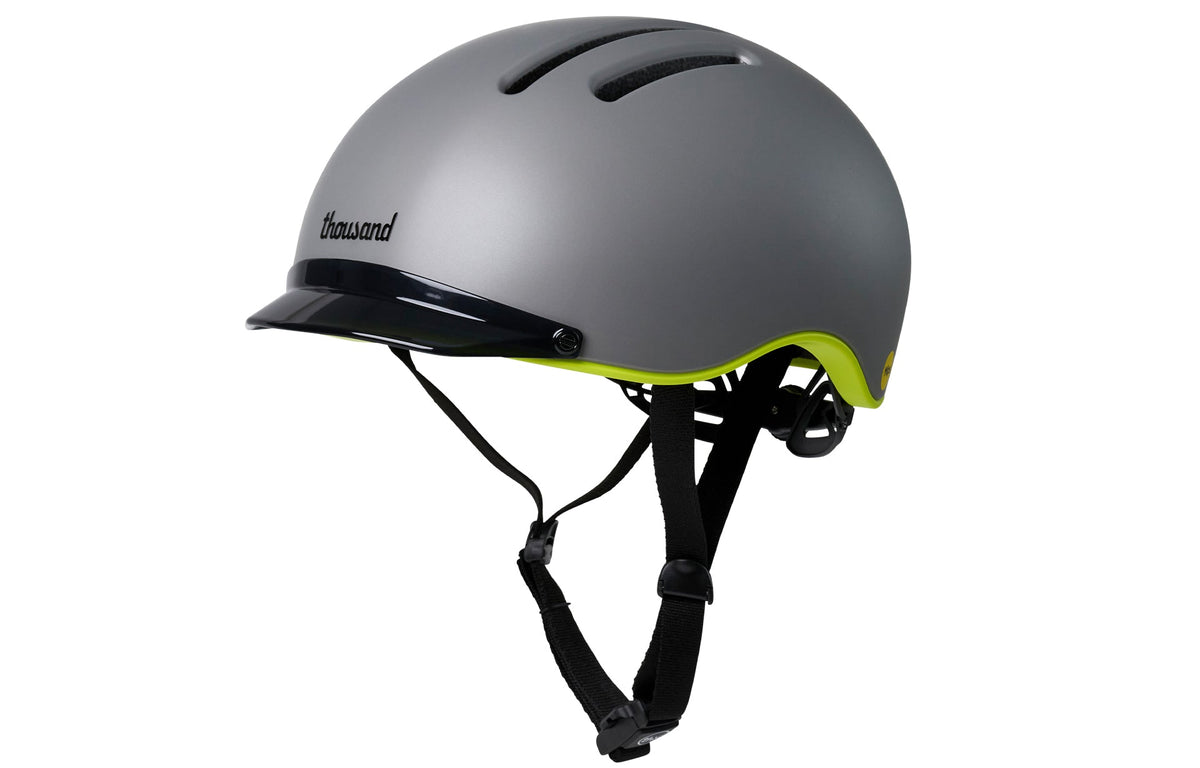 Chapter MIPS Helmet, gray with neon yellow trim, side view with straps