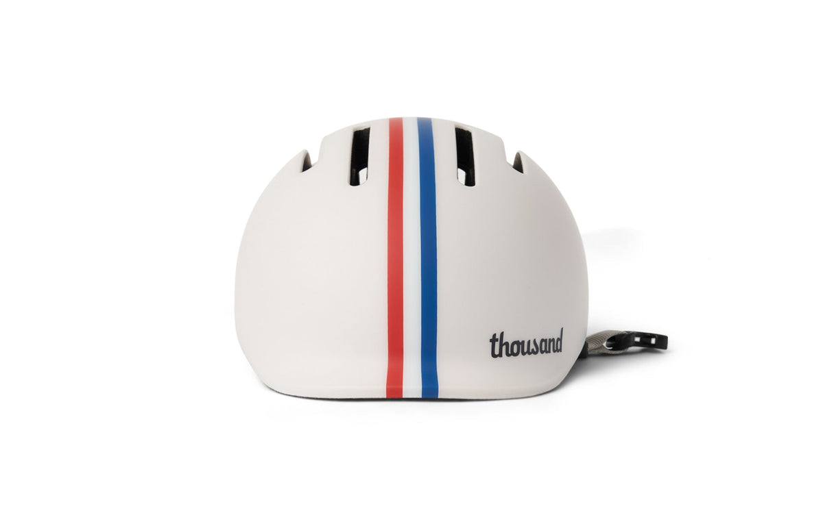 Thousand Jr. Toddler Helmet, white with red and blue stripes, rear angle