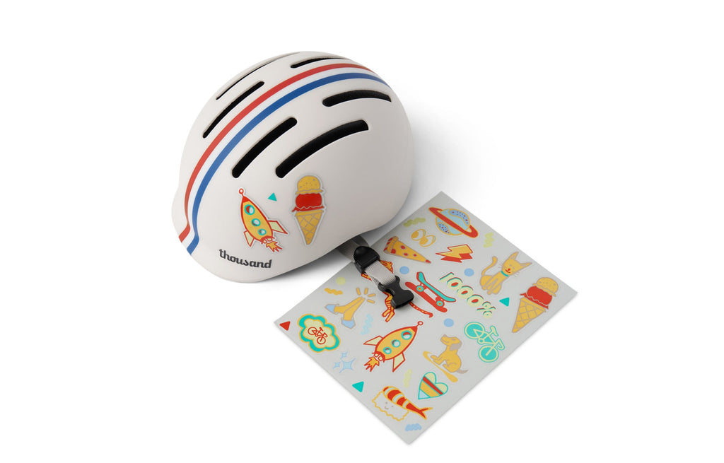 Thousand Jr. Toddler Helmet, white with red and blue stripes, with sticker sheet