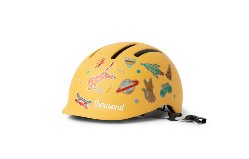 Thousand Jr. Toddler Helmet, yellow, decorated with stickers