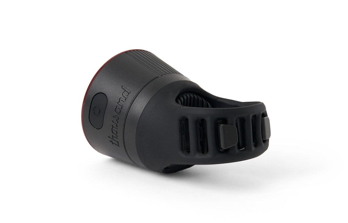 Traveler 2.0 Magnetic Bike Lights, black rear light, angled view of the strap